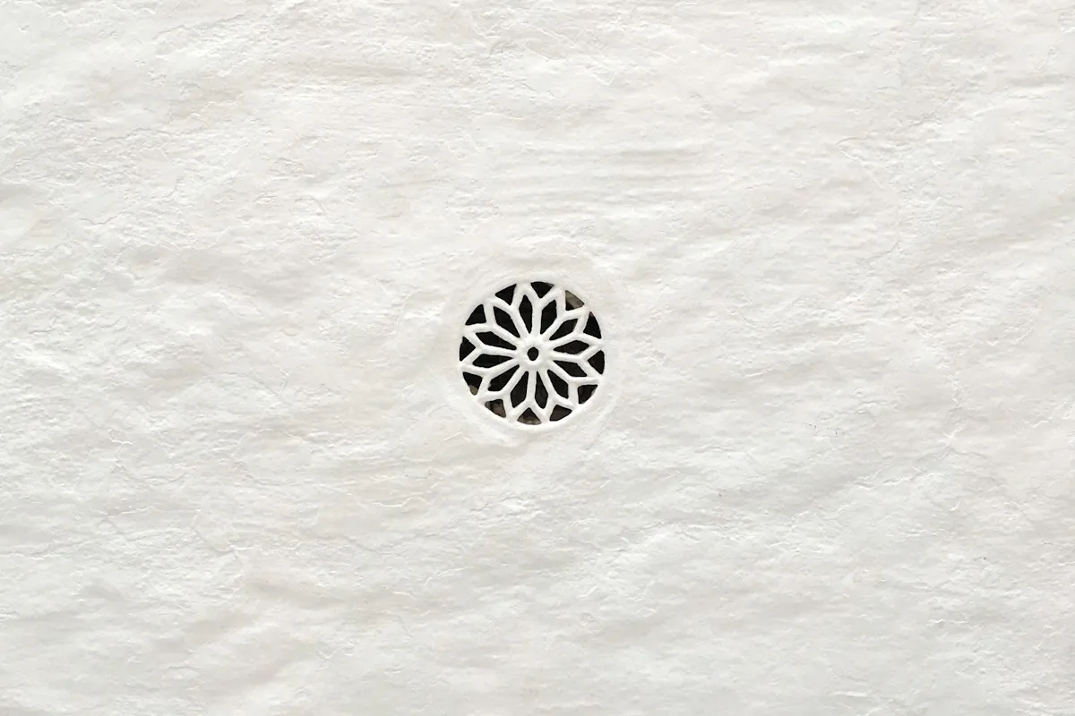 Geometric pattern carved into white paper